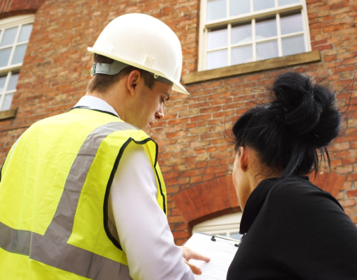 Surveyor talking to client